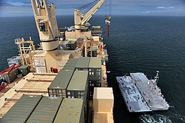 US Navy 110303-M-0074F-169 A crane offloads a beach landing module from USNS Sgt. William Button (T-AK 3012) near Camp Pendleton, Calif., during Pa.jpg