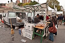 A street vendor in Union Square, New York City selling pretzels.
