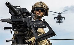 Soldier of The Welsh Cavalry with a 40mm Grenade Machine Gun in Poland as part of NATO's Enhanced Forward Presence. WELSH CAVALRY EYES AND EARS OF NATO MOD 45166150.jpg