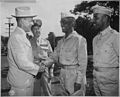 "After inspecting a regiment of Negro artillerymen during a visit to Hawaii, Under Secretary of War Robert P. Patterson - NARA - 524377.jpg