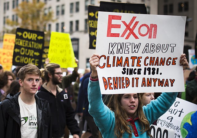 A protestor demonstrating as part of the "Exxon knew" movement in Washington, DC in 2015