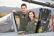 Captains Jammie and Kevin Jamieson pose for a family photo with the F-15C during their assignment to the 3rd Wing at Elmendorf Air Force Base, Ala., in Fall 2007.