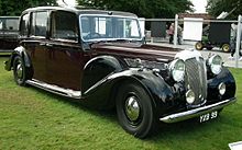 One of George VI's 1947 Daimler DE36 former State Landaulettes (now at the Coventry Transport Museum). 1947 Daimler DE36 Limousine Landaulette (YXB 99).jpg