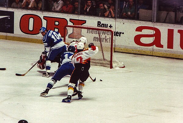 Tikkanen (number 10) battling against Germany at the 1993 World Championships