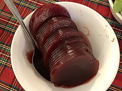 Cranberry jelly from a can, sliced