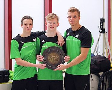 victory ceremonies. Depicted: Jonathan Schauer. Leon Mahlert. Timo Barthel.