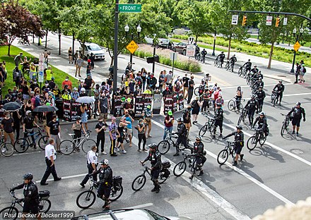 Bike cops surrounding protesters during a demonstration in the U.S.