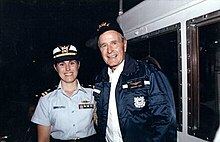 Stosz as a lieutenant in 1991, with U.S. President George H.W. Bush. ADM-Stosz001.jpg