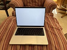 A silver MacBook Pro (14-inch, 2021) A 2021 14-inch Silver MacBook Pro.jpg