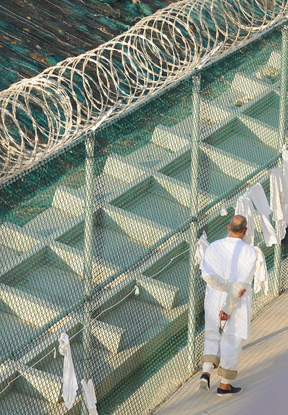 File:A detainee walks within the outdoor recreation area of Camp Six at Joint Task Force Guantanamo DVIDS373571.jpg