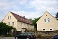 Residential house, side building, barn, gate and enclosure of a small farm