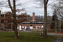 The site in 2024, after the fire. The location of the Tower can be seen by the cones in the foreground. At Wardenclyffe 2024 08.jpg