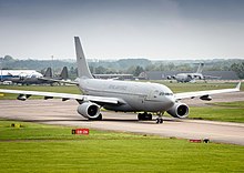 An A330 Voyager at Brize Norton during 2014. Other aircraft of the RAF's transport fleet, the C-17A Globemaster III and C-130 Hercules are in the background