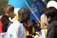 Photograph of John Mutai at the finish of the Belfast Marathon in 2010, where he was runner up