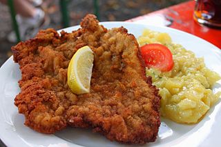 <span class="mw-page-title-main">Schnitzel</span> Breaded, fried flat piece of meat from Germany