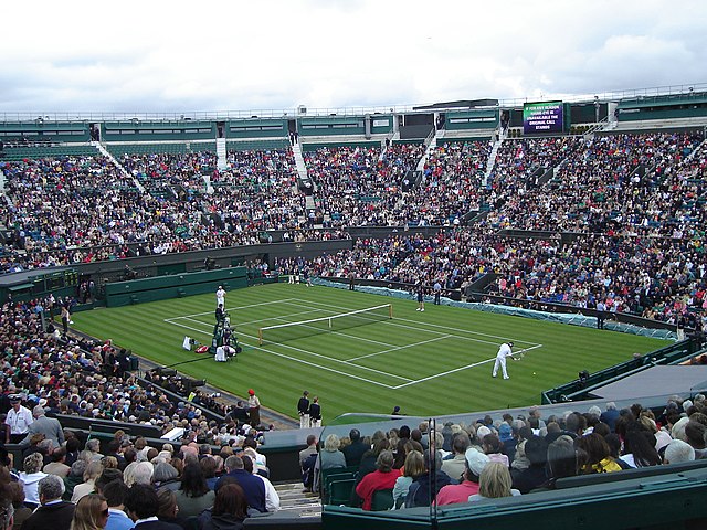 Players on Wimbledon's Centre Court in 2008, a year before the installation of a retractable roof