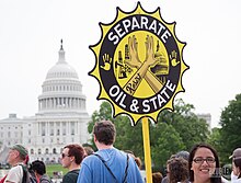 Placard "Separate oil and state", at the People's Climate March (2017) DC-Climate-March-2017-1510576 (33551760363).jpg