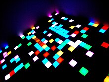 Major disco clubs had lighted dance floors, with the lights flashing to complement the beat. Dance floor 2 by harmon.jpg
