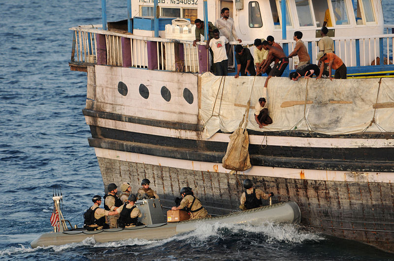 File:Defense.gov News Photo 110813-N-XQ375-361 7853 - Crewmembers aboard the Al Habib a Sri Lankan-flagged cargo vessel hoist a bag of supplies from a visit board search and seizure team in a rigid.jpg