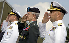 U.S. Navy Admiral Mike Mullen, chairman of the Joint Chiefs of Staff, U.S. Army General John Craddock and U.S. Navy Admiral James G. Stavridis, incoming commander, salute during the national anthem at the U.S. European Command change of command ceremony at Patch Barracks in Stuttgart in June 2009 Defense.gov photo essay 090630-N-0628-023.jpg