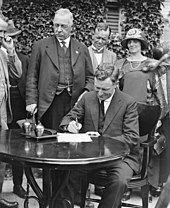   Page in 1924 as acting prime minister signing the first cabinet document prepared in Canberra