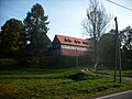 Residential stable house and side building of a four-sided courtyard