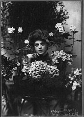 Ethel Barrymore, 1879-1959, head and shoulders, facing slightly left; behind bouquet of flowers LCCN2005684820.jpg