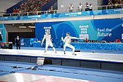 Deutsch: Fechten bei den Olympischen Jugend-Sommerspielen 2018: Tag 1, 7. Oktober 2018, Jungen, Säbel, Finale - Krisztián Rabb (HUN) - Hyun Jun (KOR) (USA) 15:13 English: Fencing at the 2018 Summer Youth Olympics at 7 October 2018 – Boys' sabre Gold medal match – Krisztián Rabb (HUN) Vs Hyun Jun (KOR) (USA) 15:13