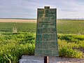 A plaque commemorating the Fort Ellice, Wood Mountain Trail that ran from Fort Ellice, Mb to Wood Mountain, Sk