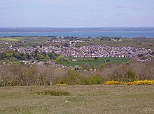 View of Freshwater from Tennyson Down, with the Solent beyond. Freshwater, IW, UK.jpg