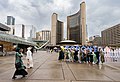 A group of ladies taking a photo at Nathan Phillips Square