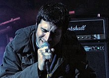 Rhys on stage with the band Mogwai in Scotland, 2001