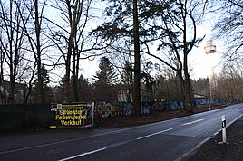 Wall of the former people's police barracks on the L23, in the background the Prötzel weather radar tower