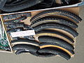 Deutsch: Glauchau - Heinz Stücke - verschlissene Fahrradmäntel English: TRANSLATE Glauchau - Heinz Stücke - worn out bicycle tires (source name: dscn3854_5._Abenteuertage_Glauchau_-_Heinz_Stücke_-_verschlissene_Mäntel.jpg)