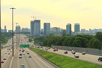 Highway 401 is a 400-series highway that passes west to east through Greater Toronto. Toronto's portion of Highway 401 is the busiest highway in North America. Highway 401 Densification.jpg