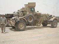 Husky bij Fob Warhorse.JPG