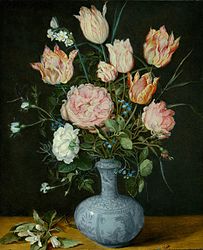 Vase of flowers on a tabletop 1610