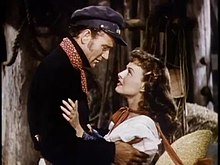 John Wayne and Paulette Goddard John Wayne and Paulette Goddard in Reap the Wild Wind trailer.jpg