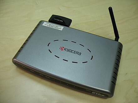 A Kyocera PC Card EV-DO router with Wi-Fi