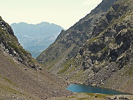 Veduta del Lago Coca. Sullo sfondo la Presolana