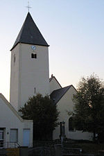 East side of the historic church with choir and defense tower