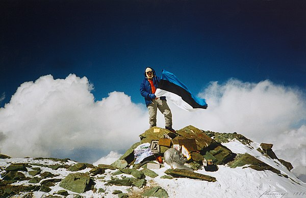 Setting up a flag could also possess the meaning of conquering something. Jaan Künnap with the flag of Estonia at the top of Lenin Peak (7,134 m [23,4