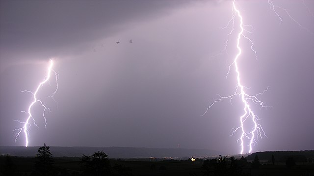 Lightning bolts strike over the city of Schaffhausen in Switzerland.