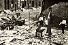 Lubin employees surveying destruction of film vault, June 1914.jpg