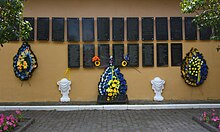 Lutsk, Kafedralna Street. Plaques with the names of the victims of the NKVD prisoner massacre Luts'k Kafedral'na 12 Mistse Masovyh Rozstriliv Zhertv Stalins'kyh Repressiy 01 1 (YDS 7423).JPG