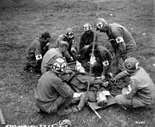 A U.S. Army Medical Corps team at work during the Battle of Normandy Medics-p013020.jpg