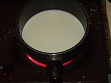 Milk being warmed on a stove Milk being warmed (117820219).jpg