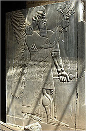 Ceremonial mace (left hand) depicted on a stela from Nimrud Nimrud stele.jpg