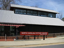 The North Carolina Pottery Center is a museum which highlights the Seagrove region's pottery traditions. North Carolina Pottery Center.JPG