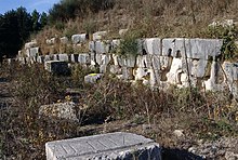 Terrace wall of Octavian's campsite memorial, with cuttings for ship's rams Octavian's campsite memorial at Actium 02.jpg